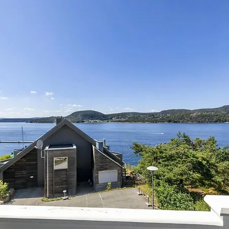 House With Multiple Terraces In *