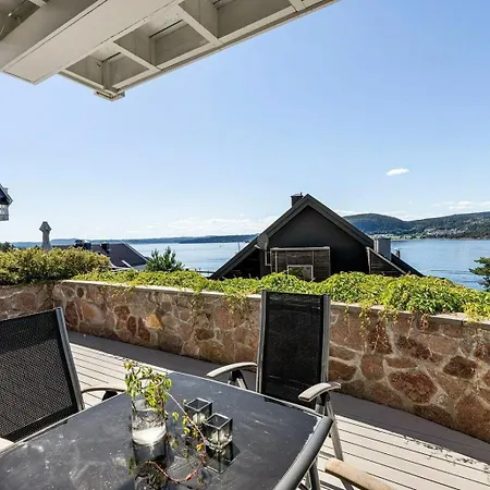 House With Multiple Terraces In *